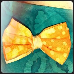 Yellow orange acid wash bow on clip